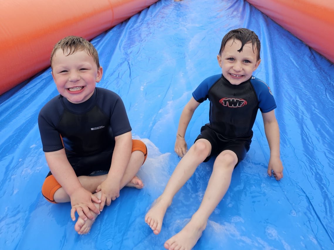 A family group enjoying rings at Kernow Slide